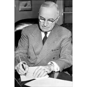 President Truman Signs Declaration of Emergency Entering U.S. into the 