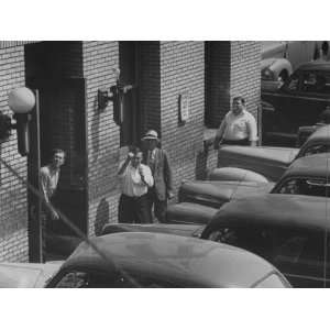  Angry Defendant Shaking His Fist at Photographer Premium 