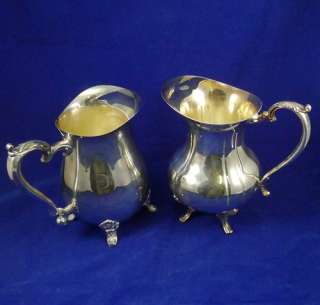 Two Vintage WATER PITCHERs Oneida SHERIDAN Silversmiths FOOT 