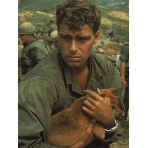  American Soldier Cradling Dog While under Siege at Khe 