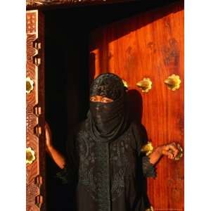  Bui Bui Standing in Zanzibar Doorway, Looking at Camera, Lamu, Kenya 