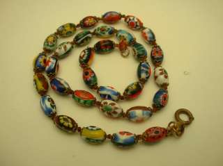 description these beads are oval and 8mm long they are hand knotted 