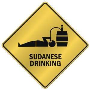    SUDANESE DRINKING  CROSSING SIGN COUNTRY SUDAN