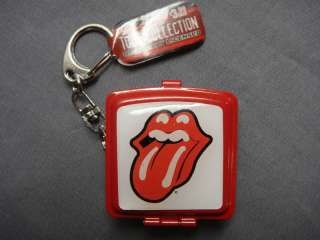   keychain travel ashtray it is red colored with the tongue and lip