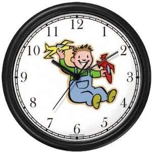  Boy Playing with Toy Airplanes Wall Clock by WatchBuddy 