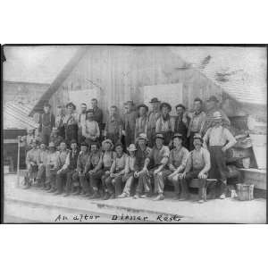 Group of 31 lumberjacks posed outside camp building,c1892,Michigan,MI 