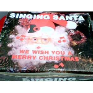  Of America, Inc. Light Sensor Activated Singing Santa #26040 Santa 