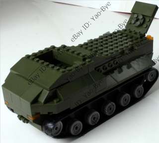 World War II military Combat vehicles w/ green tank children building 