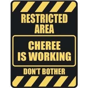   RESTRICTED AREA CHEREE IS WORKING  PARKING SIGN