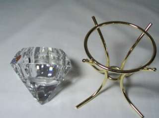 This is a 24% lead crystal   diamond shaped votive. Made in Germany by 