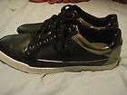   shiny silver black over tones with white bottoms size 9 / 43 SNEAKERS