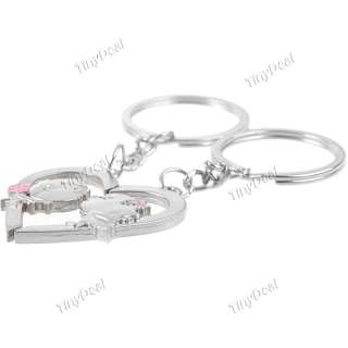   package content 1 x pair of heart shaped couples keychain
