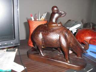carving child on back water buffalo sculpture engraving  