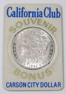 Super cool souvenir card holds an 1884 CC Carson City dollar. The coin 