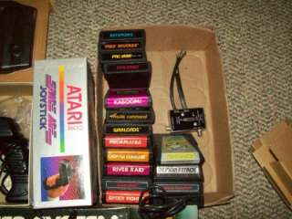 ATARI 2600 game system, new trak ball, 2 extra controllers, 16 games 