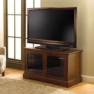 Richly crafted audio/video cabinet accommodates most flat panel HDTVs 