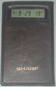 Sharp Elsi Mate EL 460 Clock & Calculator With Case  