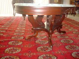 Absolutely gorgeous, Dark Mahogany oval marble top coffee table in 